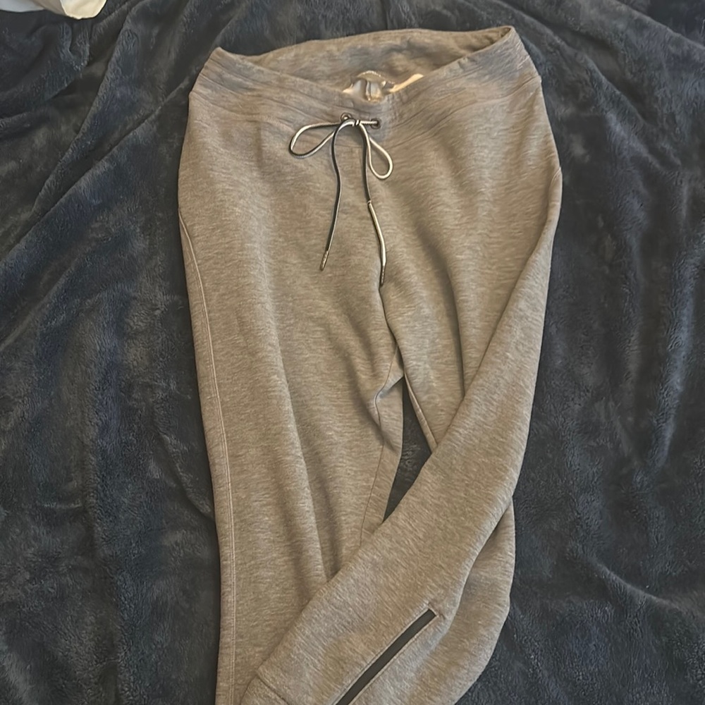 Athleta grey size medium super cozy zip bottom joggers back zip pocket